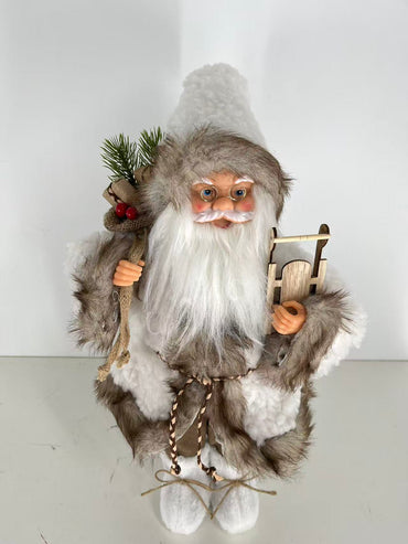 Santa Claus holding Gift Bag and Sleigh