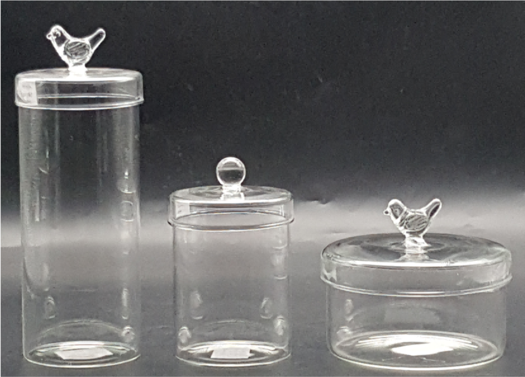Glass Canister with Glass Figurine Lids