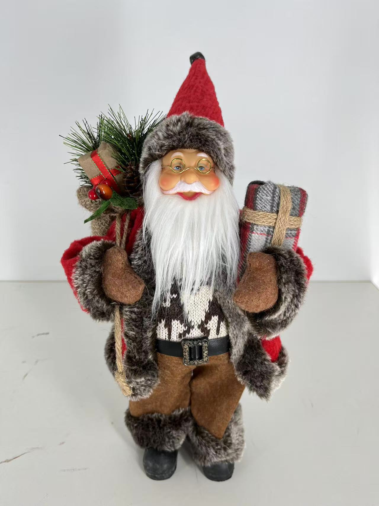 Santa Claus holding Present and Gift Bag