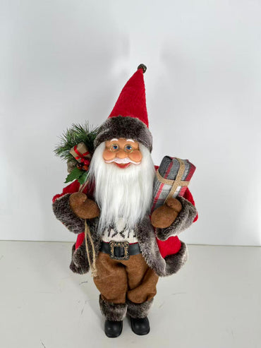 Santa Claus holding Present and Gift Bag
