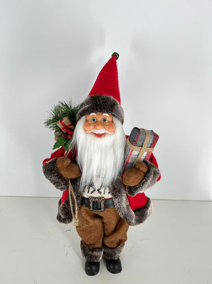 Santa Claus holding Present and Gift Bag