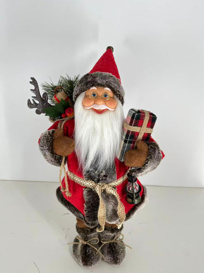 Santa Claus holding Present and Gift Bag