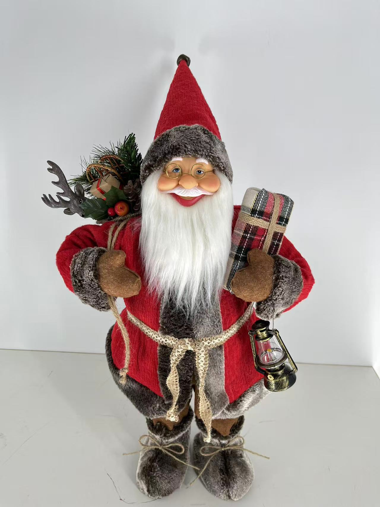 Santa Claus holding Present and Gift Bag