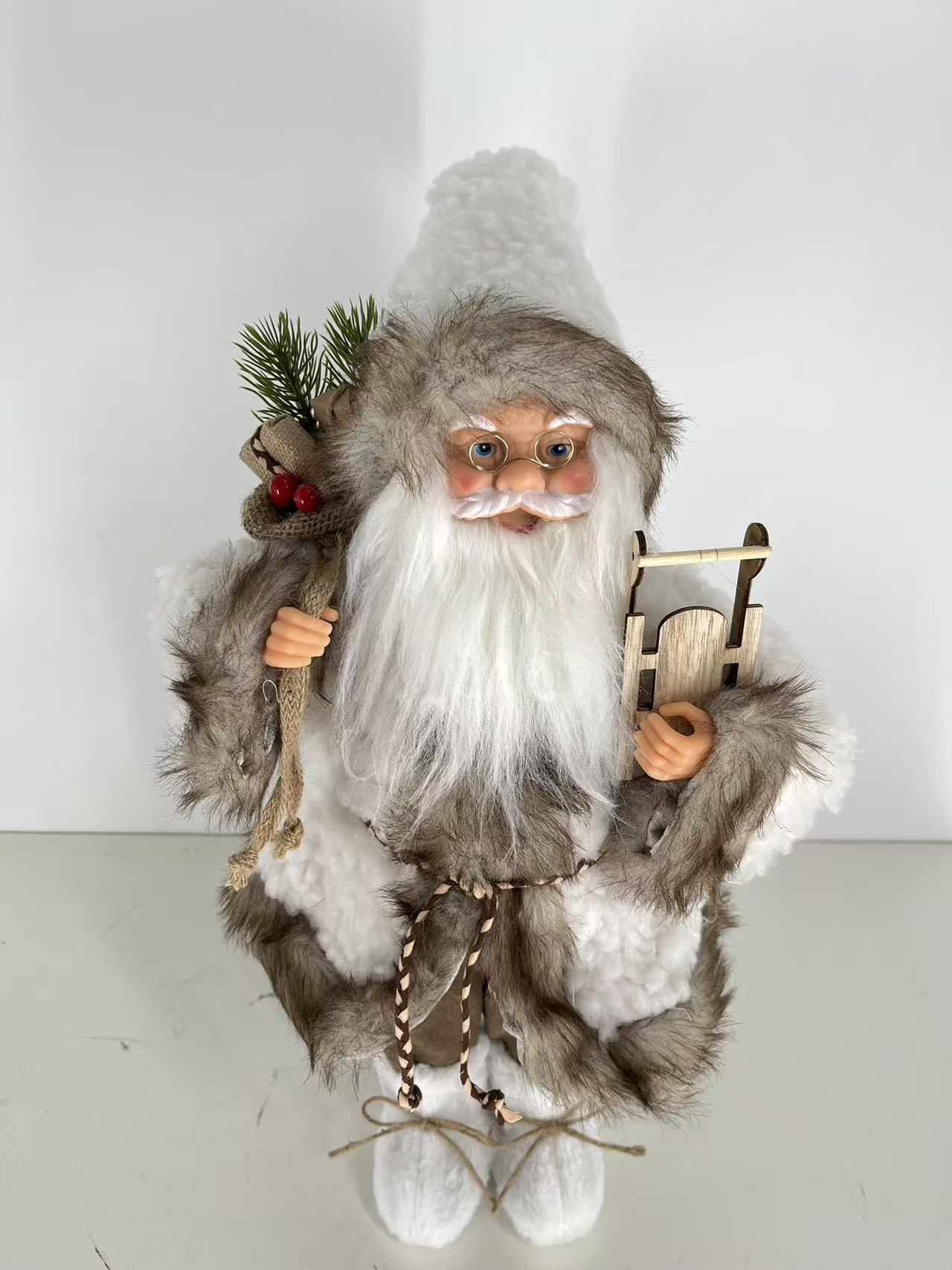 Santa Claus holding Gift Bag and Sleigh