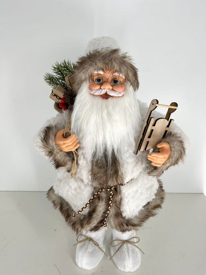 Santa Claus holding Gift Bag and Sleigh