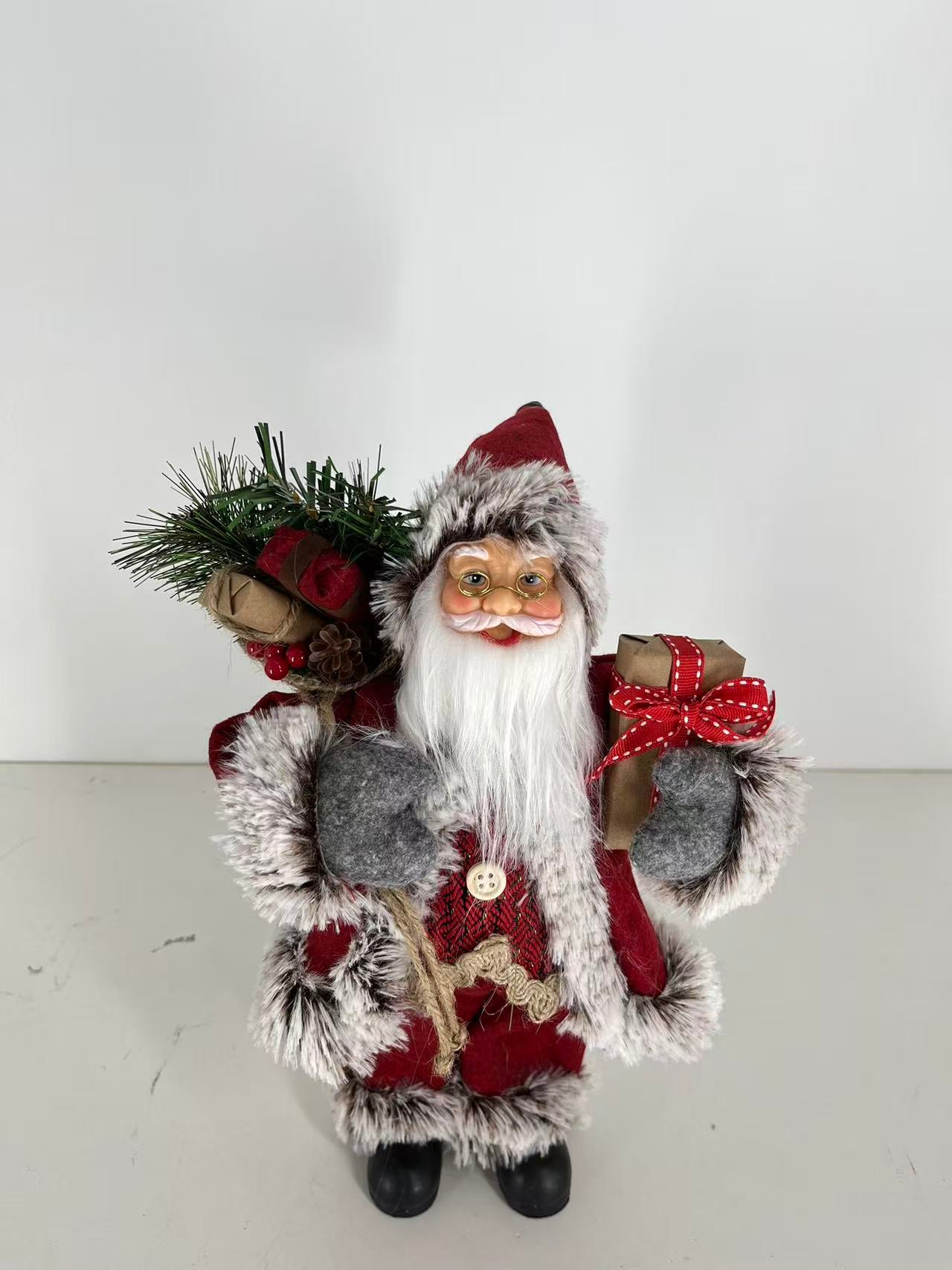 Santa Claus holding Present and Gift Bag