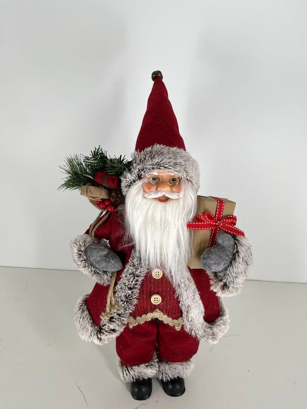 Santa Claus holding Present and Gift Bag