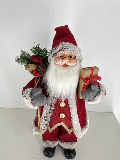 Santa Claus holding Present and Gift Bag