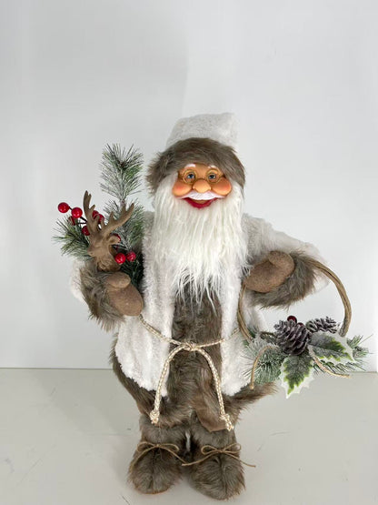 Santa Claus holding Christmas Tree and Gift Basket