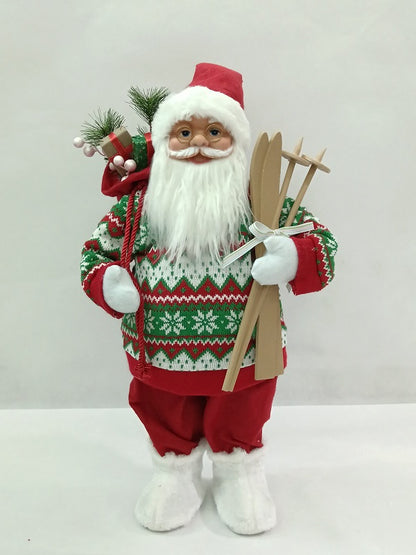 Santa Claus holding Gift Bag and Skiing Gear