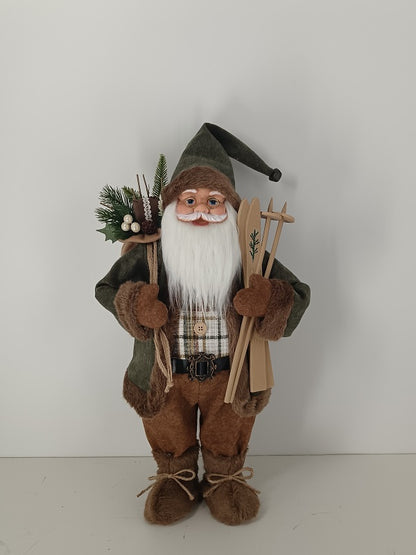 Santa Claus holding Gift Bag and Skiing Gear