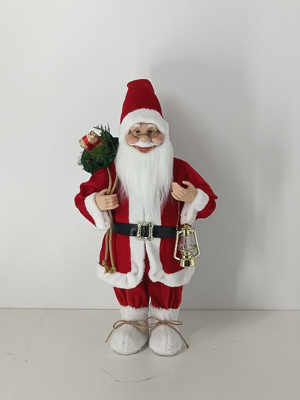 Santa Claus holding Gift Bag and Lamp