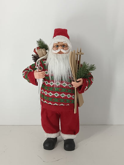 Santa Claus holding Gift Bag and Skiing Gear