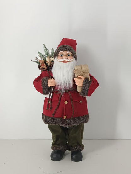 Santa Claus holding Present and Gift Bag