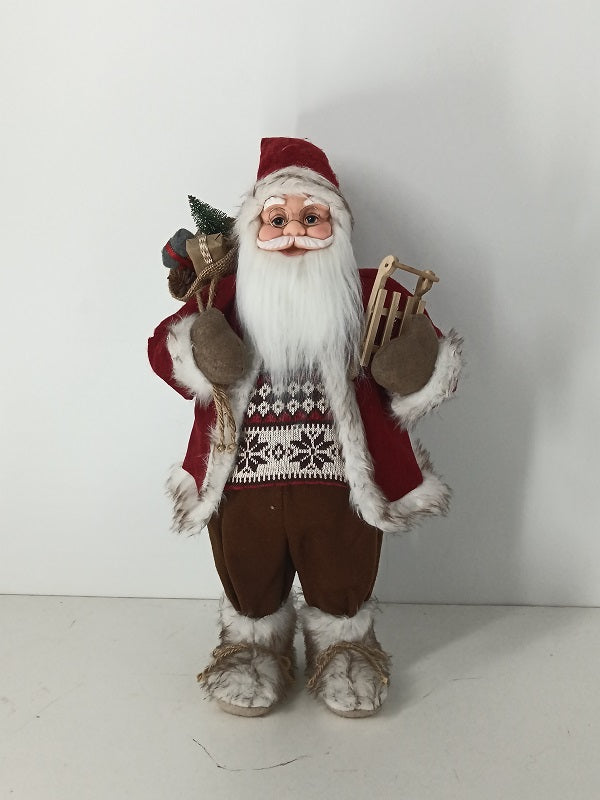 Santa Claus holding Gift Bag and Sleigh