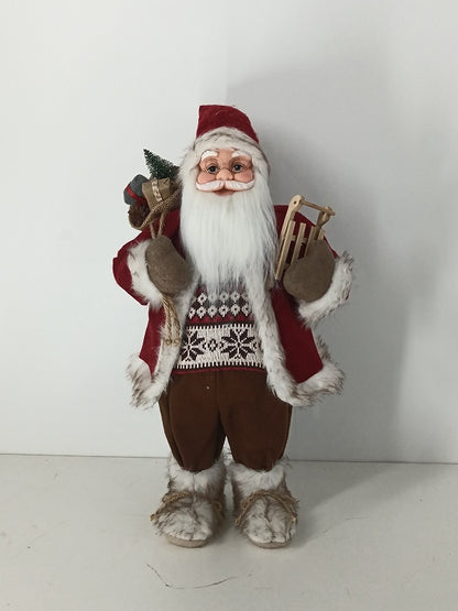 Santa Claus holding Gift Bag and Sleigh
