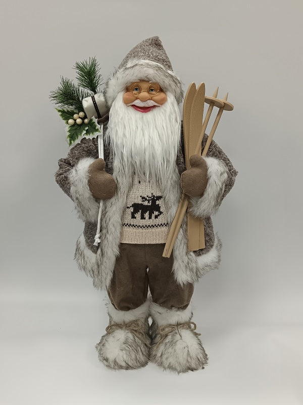Santa Claus holding Gift Bag and Skiing Gear