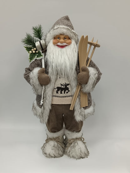 Santa Claus holding Gift Bag and Skiing Gear