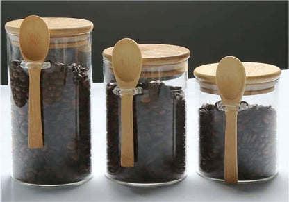 Glass Canister with Wooden Lids and Spoons